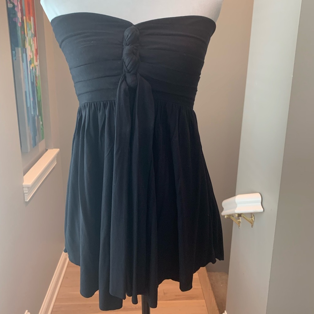 Black strapless smocked flowy top. Size medium.